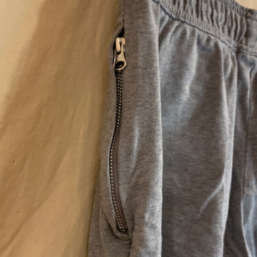 Nike Men’s Gray Athletic Shorts with Orange Swoosh - Picture 6 of 9